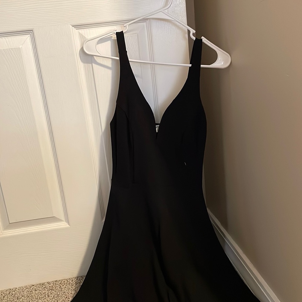 Black mini dress with sweetheart neck line